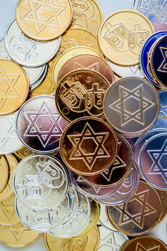 background texture close up full frame of colorful Hanukkah coins