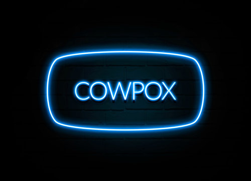 Cowpox  - colorful Neon Sign on brickwall