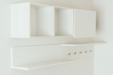 Empty White wooden shelves