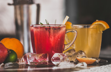 Pomegranate and orange cocktails with ice