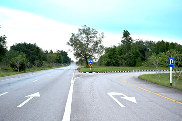 Signal, U-turn and go straight. and arrows on street