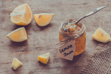 Homemade lemon jam in glass jar. Organic fresh yellow jam