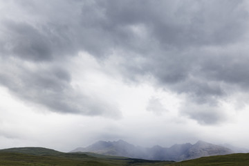 Rainshowers above Bruach na Frithe Mountain on the Isle of Skye in Scotland.