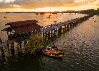 Aerial view from the drone, U Bein bridge crossing that spans the Taungthaman Lake near Amarapura in Myanmar