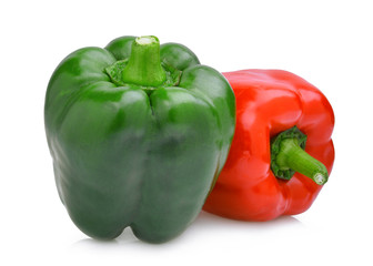 whole of green and red sweet bell pepper or capsicum isolated on white background