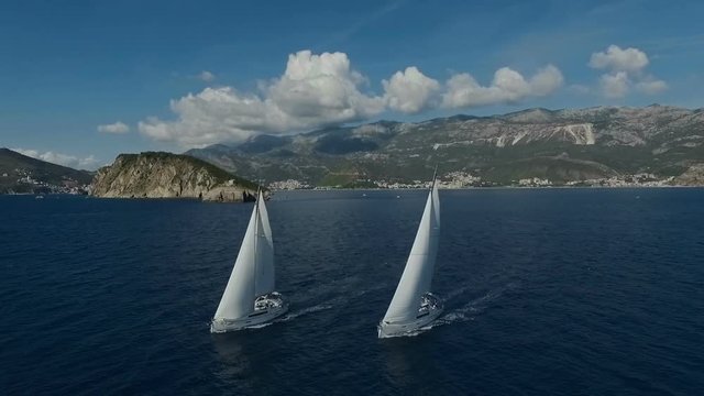 Aero shooting of two yachts in the open sea