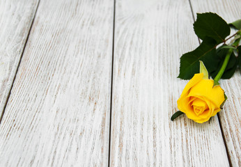 Yellow rose on a table
