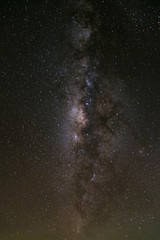 Milky way galaxy with stars and space dust in the universe, Long exposure photograph, with grain.