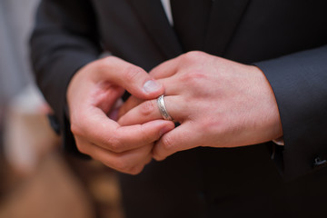 Fototapeta premium She is wearing a ring in her house and preparing for a wedding