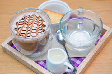 Set of hot chocolate and biscuit on wood texture