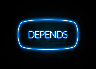 Depends  - colorful Neon Sign on brickwall