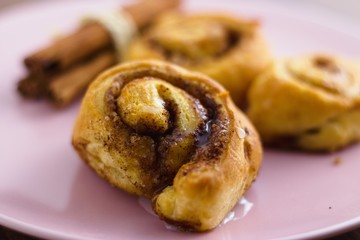 Close up on swirly cinnamon roll pastry. Homemade, gluten free delicious treat