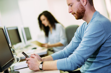 Portait of software designer working in office