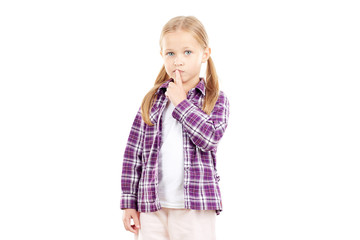 Portrait of little blonde girl in checked shirt on white background