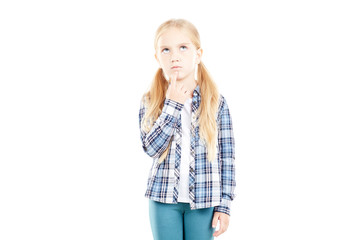 Portrait of beautiful little girl in checked shirt against white background