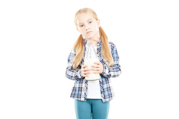 Portrait of beautiful little girl in checked shirt against white background