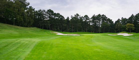 Golf Course where the turf is beautiful and green in Hokkaido, Japan. Golf is a sport to play on the turf	