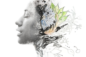 Fototapeta premium Paintography. Close up of an attractive peaceful model combined with hand drawn ink and watercolour paintings with floral motifs