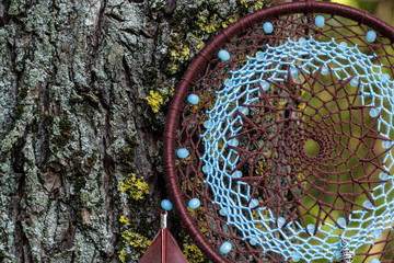 Handmade dream catcher with feathers threads and beads rope hanging