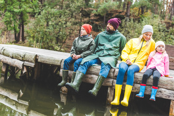 family resting at river