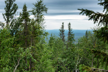 View from the mountain to the gradient blue sky