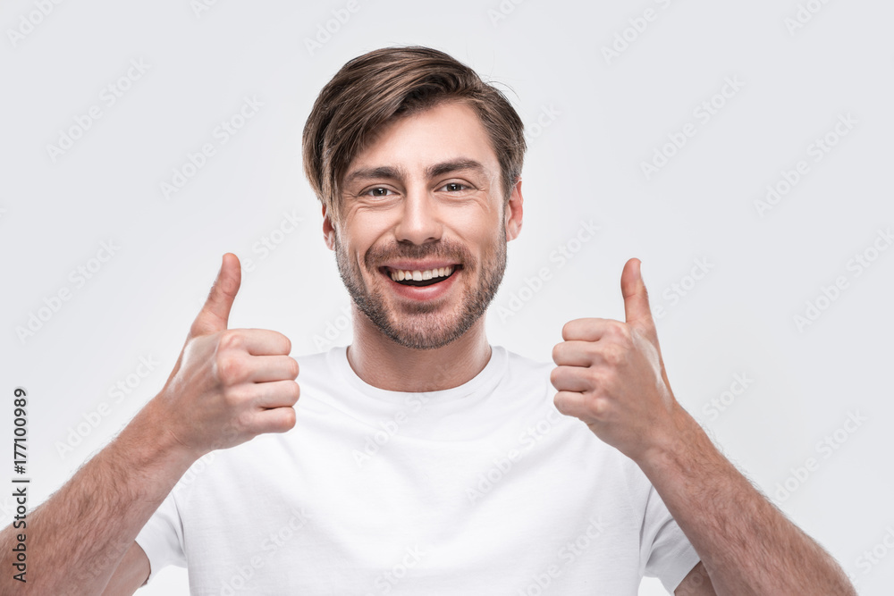 Wall mural man showing thumbs up