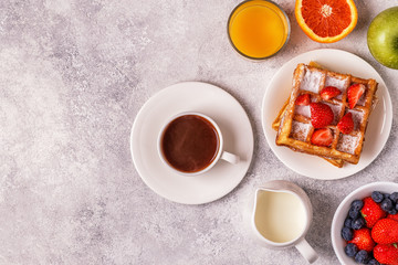 Obraz na płótnie Canvas Delicious breakfast on a light table.