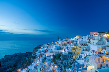 Naklejka premium Oia village at the Santorini Island at sunset