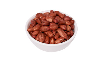 Peanuts in a white bowl on a white background. Isolate. Top view.