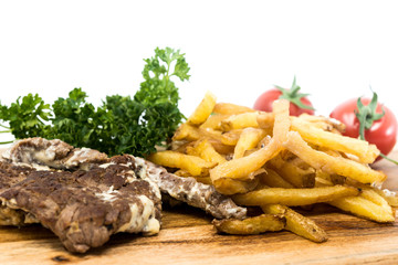 juicy steak beef meat with tomato and french fries