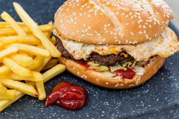 Cheese burger - American cheese burger with Golden French fries