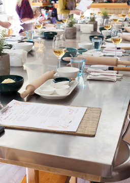 Culinary school, professional kitchen, cooking training, soft selective focus, vertical