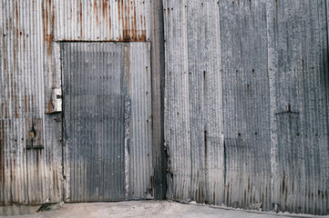 old zinc wall fence, galvanized iron wall, old film look filter effect