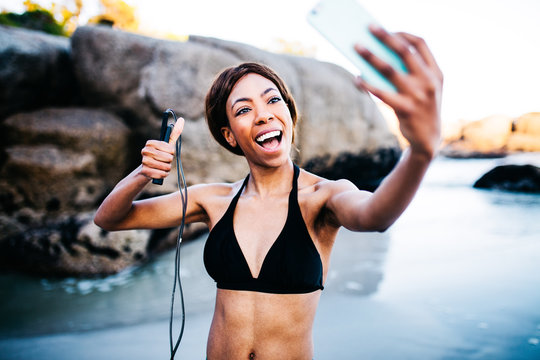 Young African Women Taking Selfie After Workout