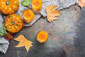 Thanksgiving autumn alcohol drink cocktail beverage with pumpkins and leaves