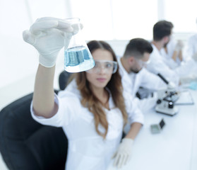 group of young scientists working in the laboratory.