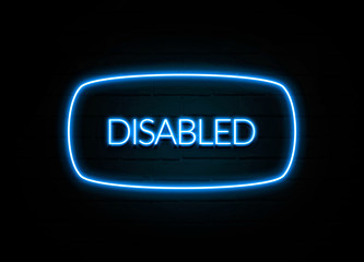 Disabled  - colorful Neon Sign on brickwall