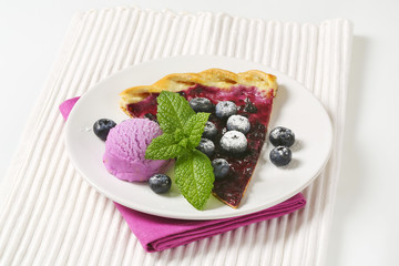 Blueberry tart with ice cream