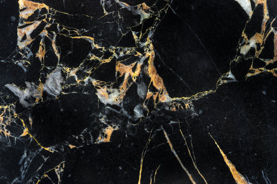 golden black marble with abstract structure detail