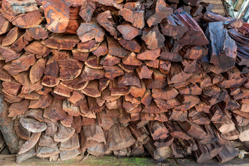 Pile of firewood. Preparation of wet from rain firewood for the winter and use for cooking, firewood in front of cottage of tribal on the mountain