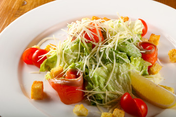 Caesar salad with salmon