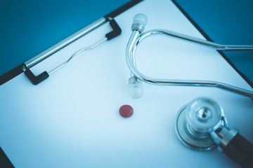 STETHOSCOPE AND CLIPBOARD CONCEPT