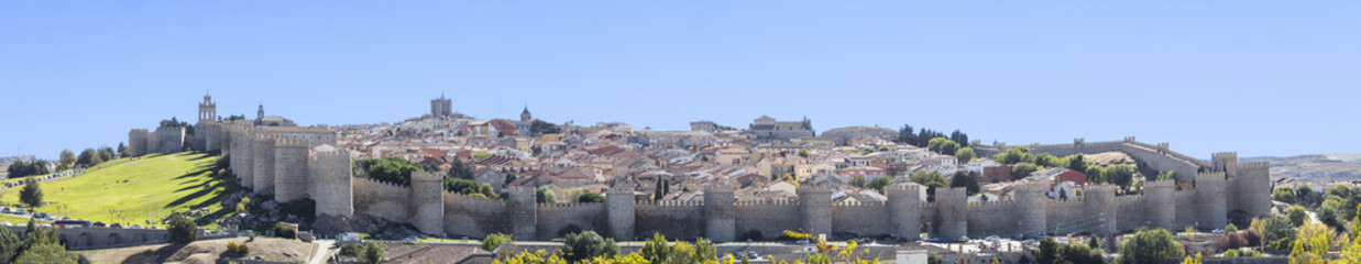 Fototapeta na wymiar Panoramic view of the historic city Avila with its famous medieval town walls surround the city, Spain. Called the Town of Stones and Saints