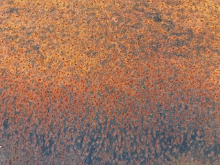 Close-up of abstract surface of rust on steel plate for grunge background
