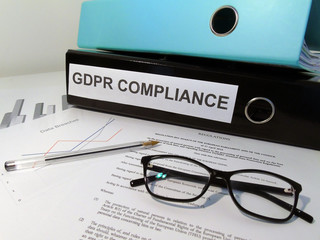 General Data Protection Regulation (GDPR) Lever Arch Folders on Cluttered Desk