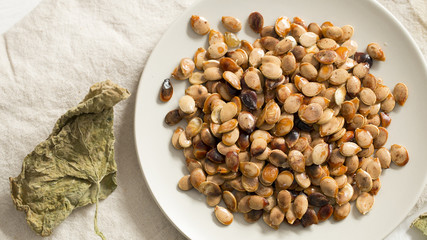 Top view of fried pumpkin seeds. 