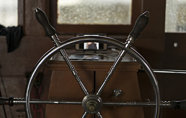 Fototapeta na wymiar Steering wheel on the boat