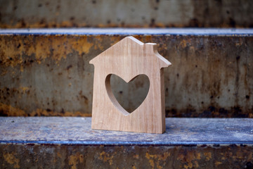 Small wooden house with a heart shaped window
