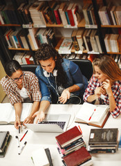 Group of female students study in the school library.Learning and preparing for university...