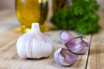 Fresh garlic on a wooden background